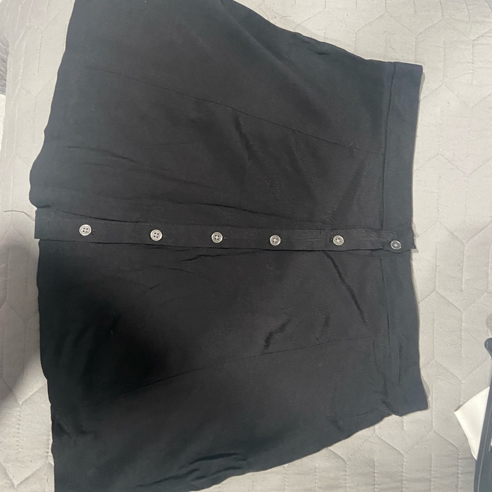 Black skirt, front buttons all the way up